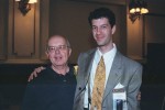 Adam Jacobi pauses with a forensic legend.